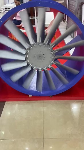 An axial fan has a motor-driven rotating shaft (axis) on which are mounted skewed blades that pull air in and force it out in a direction parallel to the shaft. Axial fans are sometimes called propeller fans. You may also hear the terms tube axial or vane axial fans. These are simply axial fans made to fit in a duct. #industrial #fans #exhaust #axialblower #seraphicbd #reels #reelsfb #reelsviral | Seraphic Associate