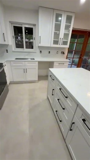 Modern White Kitchen Design with Quartz Countertops | About Kitchen & Bath
