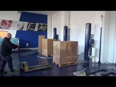 Low Profile Masterplat semi-automatic stretch wrapper by Robopac USA