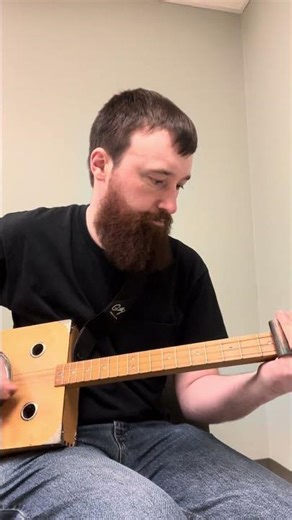 Copper Pipe Slide on a Three String Cigar Box Guitar