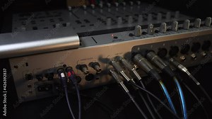 preparing sound mix panel for operation . Music record stage equipment