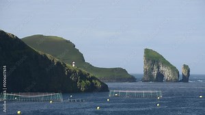 Rocks and fish farm on Vagar island, Faroe Islands, Denmark.