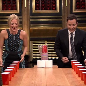 Margot Robbie Is the Beer-Drinking Teammate You Need for Your Next Game of Flip Cup—Watch Now!