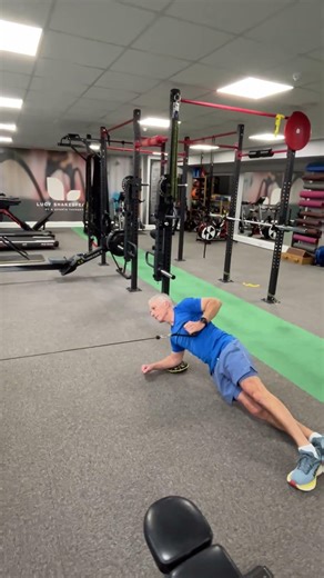Side plank cable row