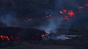 La Palma volcano engulfs more houses