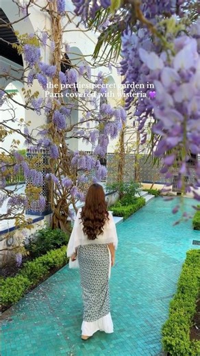 The prettiest secret garden in Paris covered with wisteria 💜