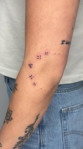 Tiny elbow tattoos