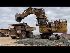 Huge Caterpillar 6040 Mining Excavator Loading Hitachi EH3500 Dumpers - Operator View