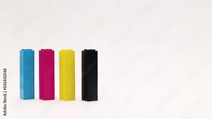 4 Columns of CMYK color toy blocks. Stop motion animation.
