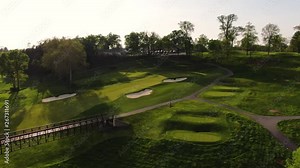 Sunrise over Lancaster country club golf course, pan over landscape and river flowing through tournament grounds
