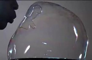 Bubble bursting in slow motion.