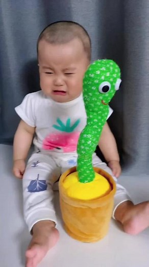 Scared Baby Reacts to Dancing Cactus Toy