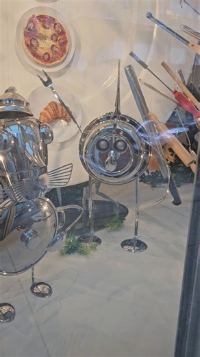 love the creative use of kitchenware. the chicken (rooster?) is my favorite #art #foodart