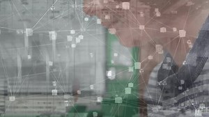 Animation of connections over hands of caucasian boy using computer. Computers, network, connections and technology concept digitally generated video.