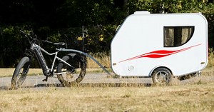 Solar-topped ebike camping trailer powers multi-day tours