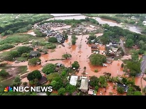 Major flood emergency prompts mass evacuations and rescues in Hawaii
