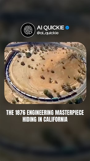 AI Quickie on Instagram: "Most people drive past it without knowing what they’re missing. The Tehachapi Loop is a railway spiral that makes trains pass over themselves to climb mountains. Built in 1876, it’s a 0.73-mile curve that gains 77 feet in elevation while keeping the grade manageable. Long freight trains literally cross over their own tracks. The engine passes above the rear cars of the same train. Nearly 40 trains use this loop every single day. A 150-year-old solution that still works