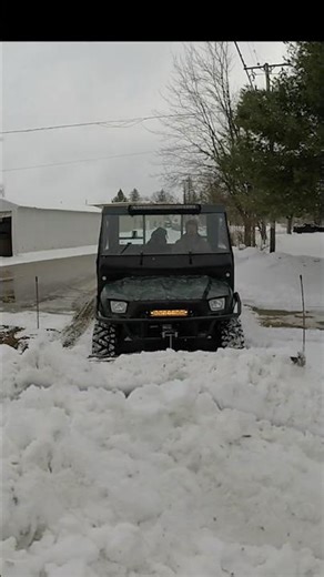 Polaris Ranger 6x6 Plowing Snow