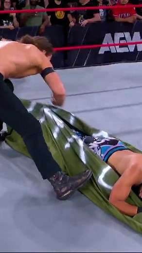 TNT Champion #JackPerry put his opponent & the TNT Title in a body bag during #AEWCollision ! #aew #allelitewrestling #prowrestling #aewallinlondon #darbyallin