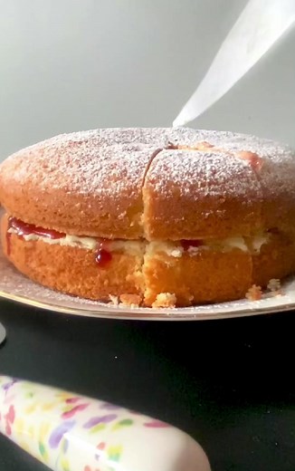 Mary Berry’s Victoria Sponge Cake with buttercream and jam or Victoria Sandwich Cake, a truly classic British dessert for a traditional tea party. Moist and rich sponges, silky vanilla buttercream and your favourite jam, what a treat that is! Super easy to make, and heavenly delicious! Recipe: https://www.mygorgeousrecipes.com/mary-berrys-victoria-sponge-cake/ #cake , #victoriasponge , #victoriaspongecake , #victoriasandwichcake , #homemadecak , #afternoonteaparty , #bakingtimeagain
