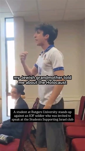 A student at Rutgers University stands up against an IOF soldier who was invited to speak #gaza