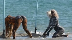 Cardi B Wears Body Paint, Sprays Champagne on Asses for Music Video