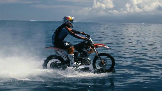 Watch Dirt Bike Ride Through Ocean Waves