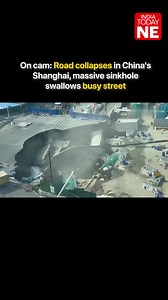 Dramatic security footage from #China's #Shanghai shows a busy road collapsing within seconds, forming a massive #sinkhole that swallowed parts of nearby structures. Experts say the city is vulnerable to subsidence due to soft soil, groundwater extraction and intense construction activity. | IndiaToday NE