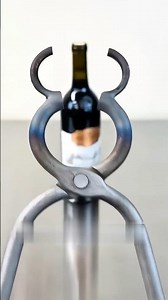 Why Is This Old Wine Bottel Being Cut Open