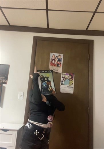 The white between the shorts and black shirt is a white undershirt.