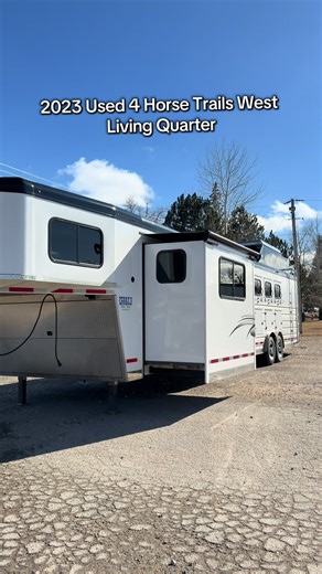 Used 2023 Trails West 4 Horse Living Quarter!! This trailer has 15x19 living quarters with a sofa, slide out dinette, kitchen and full bathroom. As well as a full rear tack with 2 four tier saddle racks, water tank and bridle hooks. The horse area has room for 4 horses with dividers and fans. This trailer also has a generator, mangers, power awning, and hay rack. Call us (307)672-0690 or check out our website perrystrailers.com #livingquarter #horsetrailer #usedtrailer #trailersales