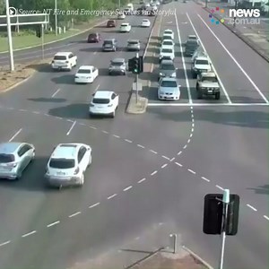Somehow they didn't hit a single other car after ploughing through six lanes of traffic in Darwin 🤯 | News.com.au