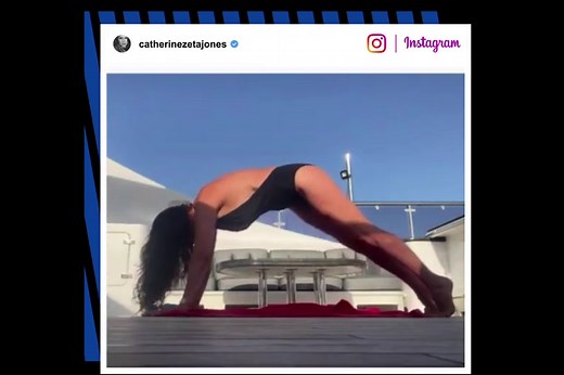 Catherine Zeta Jones does yoga in plunging backless bathing suit on yacht