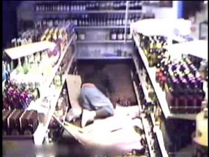 drunk guy breaks into liquor store