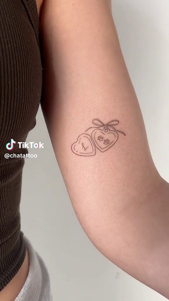 Unique Dog Paw Locket Tattoos in Los Angeles