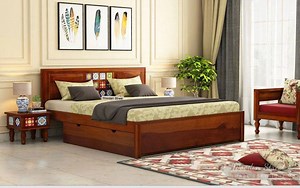 Open doors for a punch of #classicism in your bedroom with Boho double bed. It's #ChicBoho design on the headboard and the wood grain patterns all over the footboard, give Boho its #signature look Click here to buy: https://www.woodenstreet.com/boho-bed-with-storage | Wooden Street | Facebook