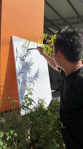 Using shadows as outlines to capture the spirit of bamboo and using brushstrokes as rhythm