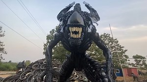 Recycling Sculptor Makes Life-Size “Alien King” Out of Used Tires