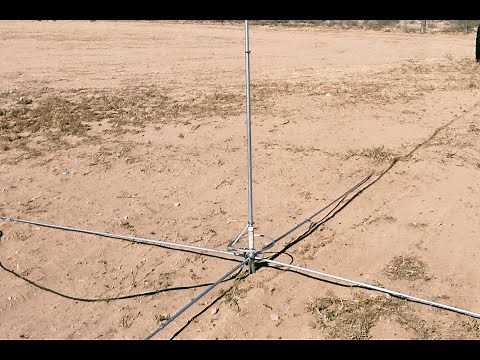 Maco V5000 Antenna in the dirt, DX with "World Radio 0108" near the Florida Space Center 5/5/2023