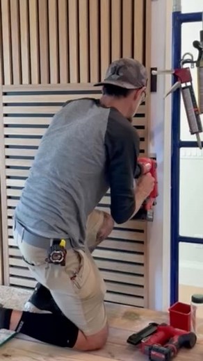 It’s a white oak slat on a smoked oak backing, which is technically called fumed oak, but we call it smoked oak because it’s not a stain. It’s not a dark stain. It’s actually fumed. Get that darkness into the wood grain of the oak. So you still see a lot of the natural wood grain popping through, but this gives us a nice contrast. Like I said, it still looks very natural. It’s totally unique and beautiful, and we’re excited to see it being installed in the home. It’s for a custom home in Florida