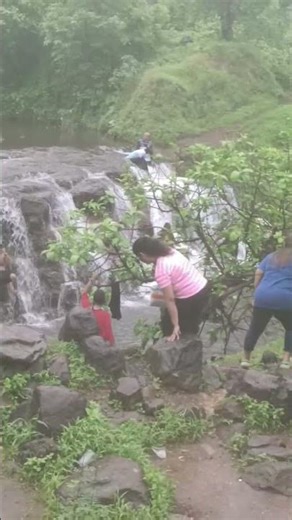 "Nature Lover’s Dream | Waterfall Shower in the Wild"