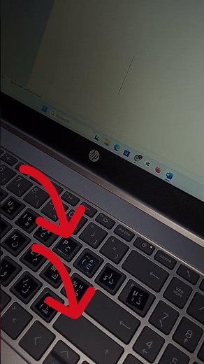 How can I easily type a semicolon (;) on an Arabic keyboard?