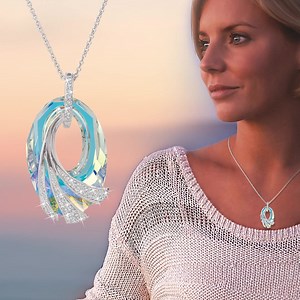 Thrilling to see! A magnificent Aurora Borealis crystal with a magical display of color that will steal the show! | The Danbury Mint