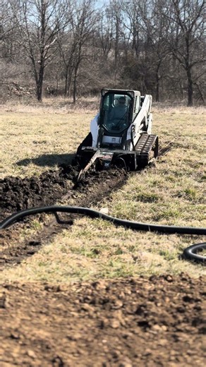 Trenching Through Mud… Installing Drain Tile
