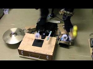 The original Foot Drum system using small cajón (Foot Percussion)