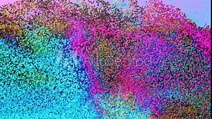 dynamic moving of particles like small balls of different colors. 3d render animation