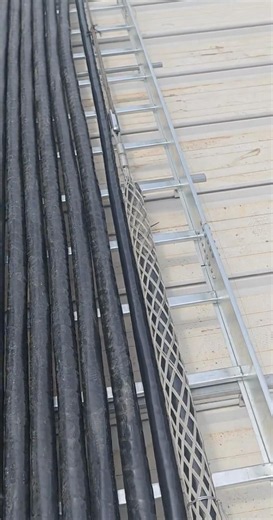Long distance cable laying on cable tray operation with diesel winch and turning pulleys