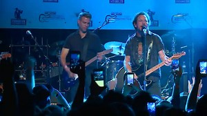 140K views · 1.8K reactions | Cubs' Theo Epstein joined Pearl Jam frontman Eddie Vedder onstage to play something a little more rocking than "Take Me Out to the Ballgame" | WGN TV | Facebook