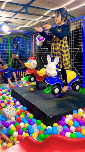 Beautiful princesses dancing on a white rabbit odong swaying colorful mini ball pool ride exciting