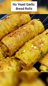 No yeast garlic bread rolls recipe Ever wonder how to make Soft Garlic Bread Roll recipe? Then this homemade garlic bread roll recipe is the answer. You can make it at the comfort of your home with this easy recipe. No oven, no yeast is used to prepare this Unique Garlic Bread recipe. Simple to make with ingredients easily available in every kitchen. Today I have fried the garlic bread rolls but you can also bake them in oven. The taste of this garlic bread roll is similar to the ones we get in 